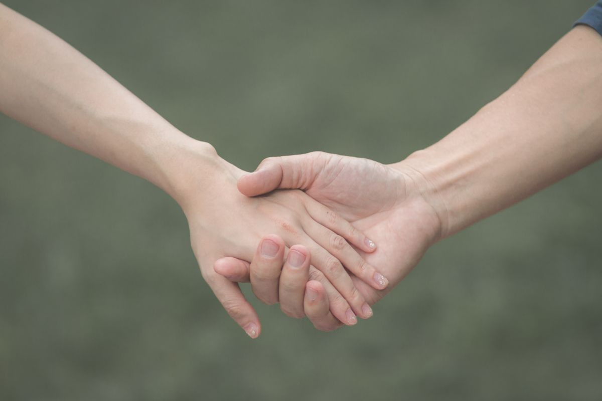 Young couples walk in the morning garden happily and walk hand in hand to the sun to watch the sun rise together in the bright morning of summer.
Love Friendship Concept,
And Valentine day background.