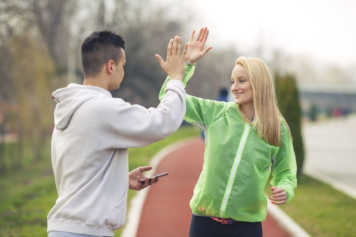 Young woman happy to successfully finish exercise